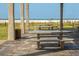 Sheltered picnic area featuring concrete tables overlooking a beautiful beach at 500 N Jefferson Ave # A3, Sarasota, FL 34237