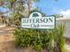 Community sign for Jefferson Club surrounded by manicured landscaping at 500 N Jefferson Ave # A3, Sarasota, FL 34237