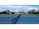 Well-maintained tennis courts offering a recreational amenity with clear blue skies at 512 W Venice Ave # 102, Venice, FL 34285