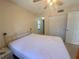 Bedroom with closet and ceiling fan at 519 Albee Farm Rd # 116, Venice, FL 34285