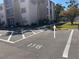 Ample parking spot designated spot for the property's residents at 519 Albee Farm Rd # 116, Venice, FL 34285