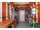 Organized garage with workbench, shelving, and tools for various projects and storage solutions at 6037 Shearwater Dr, Englewood, FL 34224