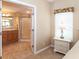 Bright bedroom with en-suite bathroom provides a private and convenient space for relaxation and daily routines at 6037 Shearwater Dr, Englewood, FL 34224