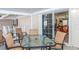 Covered patio with outdoor seating, perfect for enjoying relaxing outdoor meals at 6037 Shearwater Dr, Englewood, FL 34224