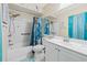 Well-lit bathroom with a shower-tub combo and tasteful nautical decor at 614 N Jefferson Ave # 27, Sarasota, FL 34237