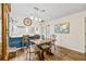Charming dining room with decorative accents and an adjacent open kitchen at 614 N Jefferson Ave # 27, Sarasota, FL 34237