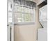 Bright laundry area next to a window at 614 N Jefferson Ave # 27, Sarasota, FL 34237