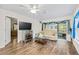 Comfortable living room with sliding doors, providing plenty of natural light and outdoor access at 614 N Jefferson Ave # 27, Sarasota, FL 34237