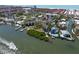 Waterfront condos, boat docks, a pool, lush landscaping, and nearby ocean access create an ideal coastal living experience at 6157 Midnight Pass Rd # D31, Sarasota, FL 34242