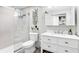 Bathroom with a glass-enclosed shower, vanity, and stylish decor at 6157 Midnight Pass Rd # D31, Sarasota, FL 34242
