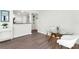 Dining area featuring wood floors and modern decor at 6157 Midnight Pass Rd # D31, Sarasota, FL 34242