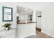 Kitchen with breakfast bar and easy access to all parts of the home at 6157 Midnight Pass Rd # D31, Sarasota, FL 34242