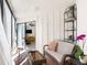 Cozy sunroom with wicker furniture and sliding glass doors at 6157 Midnight Pass Rd # D31, Sarasota, FL 34242