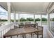 Spacious covered patio with tables and chairs overlooking the community at 6210 Cormorant Ct, Bradenton, FL 34203