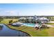 Beautiful community pool in a neighborhood with a golf course, a club and lakes at 651 Back Nine Dr, Venice, FL 34285