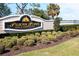Attractive entrance to the Pelican Pointe Golf & Country Club with lush, mature landscaping at 651 Back Nine Dr, Venice, FL 34285