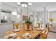 Dining room featuring a pass through view of the kitchen at 651 Back Nine Dr, Venice, FL 34285