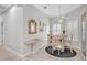 Cozy dining area with natural light and neutral colors at 651 Back Nine Dr, Venice, FL 34285