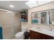 Bathroom featuring walk-in shower, modern fixtures, and plenty of storage space at 66 Boundary Blvd # 275, Rotonda West, FL 33947