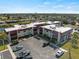 Spacious condo complex featuring ample parking and landscaping at 66 Boundary Blvd # 275, Rotonda West, FL 33947
