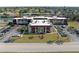 Well-maintained condo building with lush green surroundings and parking at 66 Boundary Blvd # 275, Rotonda West, FL 33947