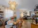 Open-concept space with a dining area and comfortable living area at 66 Boundary Blvd # 275, Rotonda West, FL 33947