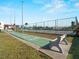 Community shuffleboard and tennis courts, offering recreational amenities for residents at 66 Boundary Blvd # 275, Rotonda West, FL 33947