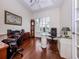 Office space with hardwood floors, large window and ceiling with recessed lighting at 692 Egret Walk Ln, Venice, FL 34292