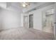 Spacious primary bedroom boasts en-suite bath, walk-in closet, and light-filled spaces at 7104 L Pavia Blvd # 7104, Venice, FL 34292