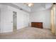 Bright bedroom features vaulted ceiling, neutral carpet, large dresser and walk-in closet at 7104 L Pavia Blvd # 7104, Venice, FL 34292