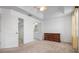 Bright bedroom features vaulted ceiling, carpet flooring, walk-in closet, and bathroom access at 7104 L Pavia Blvd # 7104, Venice, FL 34292