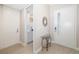 Bright foyer with decorative mirror and tiled floor leading to the rest of the home at 7407 S Blue Sage, Punta Gorda, FL 33955