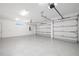 Spacious three-car garage with clean, epoxy-coated floors and ample storage at 7407 S Blue Sage, Punta Gorda, FL 33955