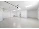 Bright three-car garage with clean, epoxy-coated floors and ample space at 7407 S Blue Sage, Punta Gorda, FL 33955