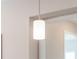 A close-up shot of a contemporary pendant light hanging indoors at 7407 S Blue Sage, Punta Gorda, FL 33955