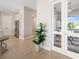 Bright, open-concept living area featuring modern decor and tile flooring throughout at 7407 S Blue Sage, Punta Gorda, FL 33955