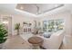 Spacious living room with neutral tones, recessed lighting, and access to the screened-in patio at 7407 S Blue Sage, Punta Gorda, FL 33955