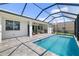 Beautiful outdoor pool with a screened enclosure and ample patio space at 7407 S Blue Sage, Punta Gorda, FL 33955