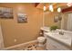 Bright bathroom features a white vanity, neutral tones, and ample lighting at 7941 Pineglen Ct # 37, Sarasota, FL 34238