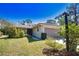 Well-maintained home boasts lush landscaping and a cozy curb appeal with a long driveway at 7941 Pineglen Ct # 37, Sarasota, FL 34238