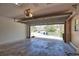 Spacious two-car garage featuring an automatic door and a clear view of the neighborhood at 7941 Pineglen Ct # 37, Sarasota, FL 34238