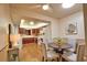 Bright kitchen open to dining area with contemporary furnishings and stylish decor at 7941 Pineglen Ct # 37, Sarasota, FL 34238