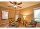 Inviting living room with comfortable seating and ample natural light creates a warm ambiance at 7941 Pineglen Ct # 37, Sarasota, FL 34238