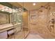 Glass enclosed shower with built-in shelf at 7941 Pineglen Ct # 37, Sarasota, FL 34238