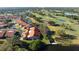 Aerial shot highlighting the townhome community's proximity to the golf course at 867 Country Club Cir #71, Venice, FL 34293