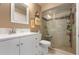 Bathroom with a modern vanity, large mirror, and walk-in shower at 867 Country Club Cir #71, Venice, FL 34293