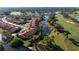 Beautiful villa situated on the water and golf course with meticulously kept landscaping at 867 Country Club Cir #71, Venice, FL 34293