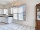 Bright kitchen area with ample natural light and white cabinetry for a clean, modern look at 904 Harbor Town Dr, Venice, FL 34292
