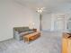 Inviting living room features neutral carpet and seamlessly connects to other living spaces at 904 Harbor Town Dr, Venice, FL 34292