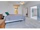Main bedroom leads to bathroom and patio for convenience at 904 Harbor Town Dr, Venice, FL 34292